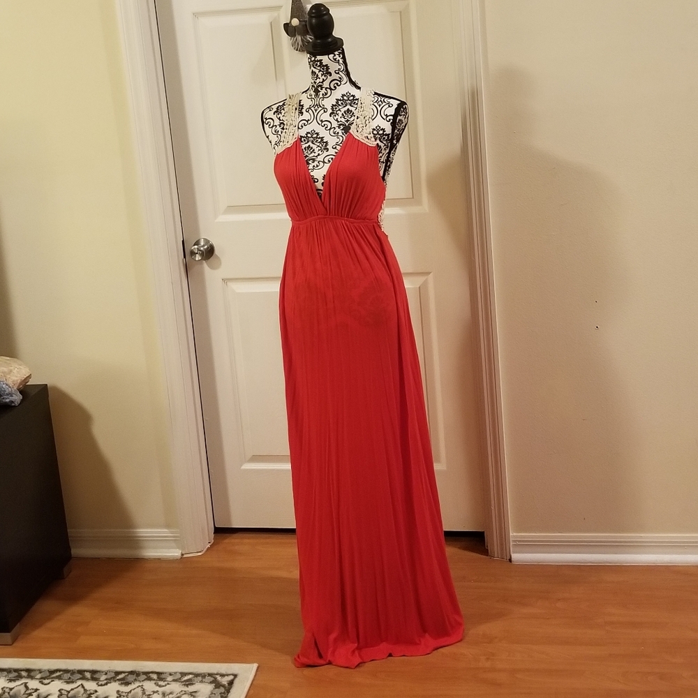 Jersey knit floor length lace back maxi dress.